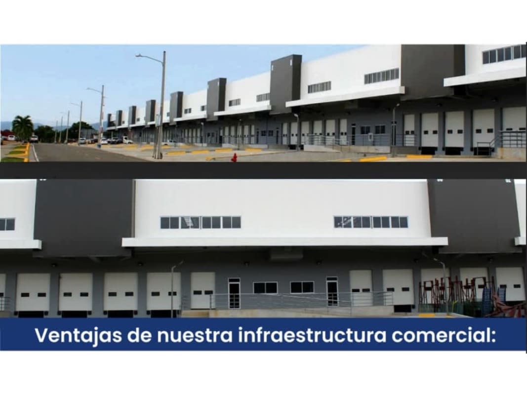 Front of industrial warehouse complex with loading docks, wide driveway in Don Bosco Panama