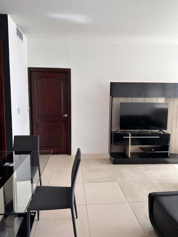 Bright living room with large windows overlooking Pacific Ocean in PH Oceanaire Punta Pacifica