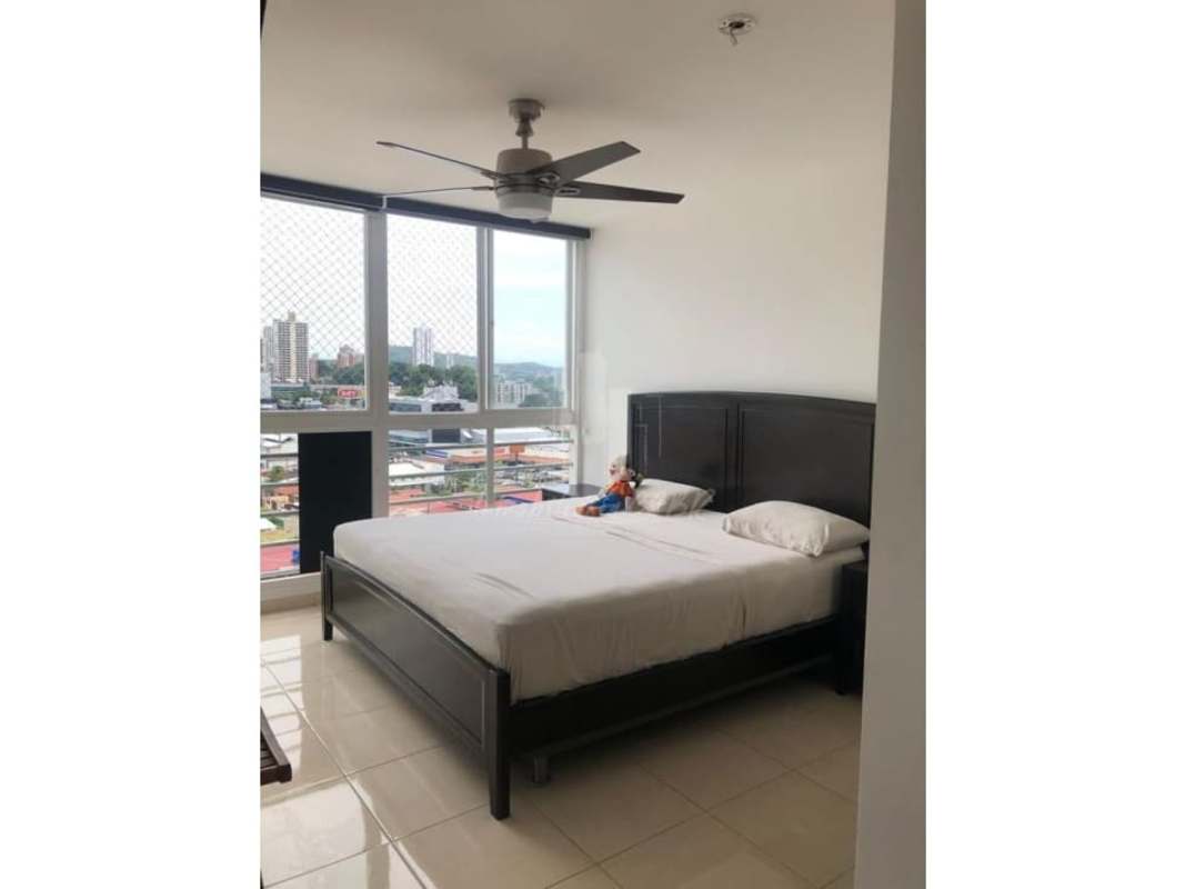 Bedroom with AC, ceiling fan, window with city view and built-in closet in PH Sabana Tower Panama