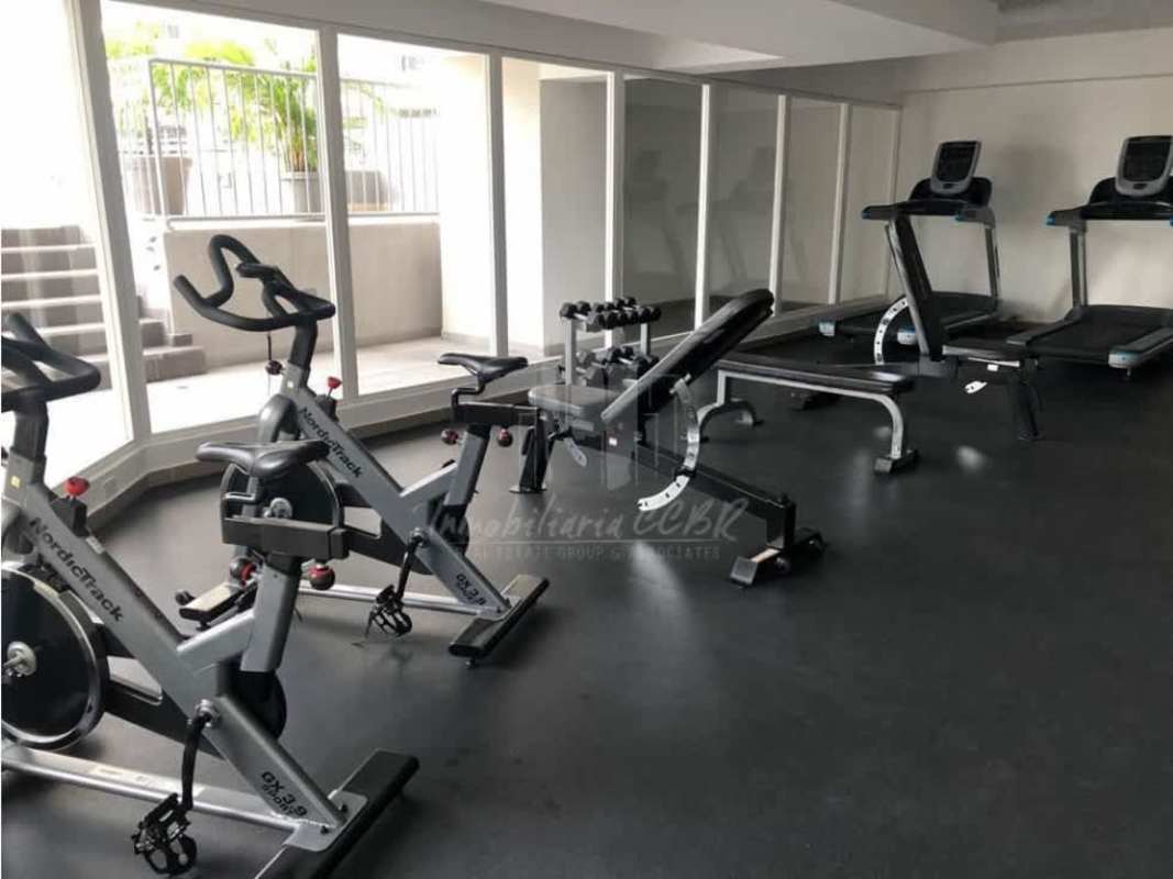 Shared apartment complex gym with cardio and weight equipment PH Sabana Tower Panama City