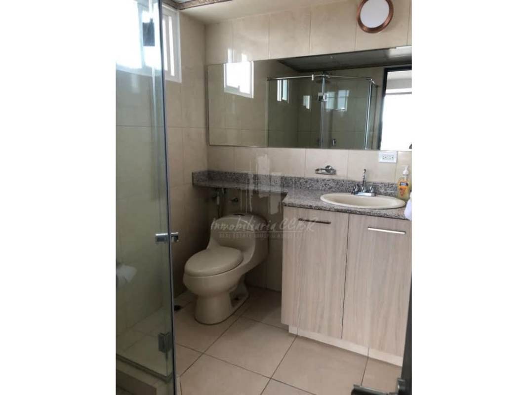 Walk-in closet built-in storage and access to bathroom PH Sabana Tower apartment Panama