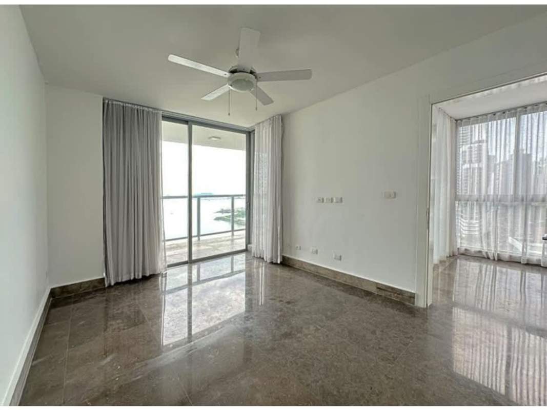Spacious living room connected to glass balcony at PH YOO Panama Avenida Balboa