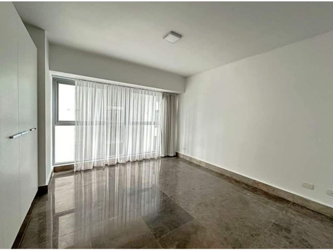 Spacious bedroom with large window, built-in closet and ocean views in PH YOO tower Panama