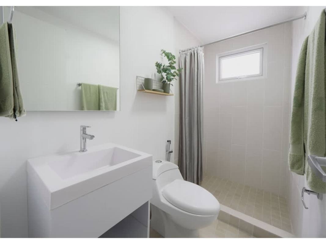 Minimalist bathroom with walk-in shower and modern tile in Panama Viejo Residences