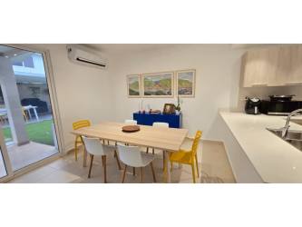 Spacious living room and dining area with plenty of natural light in Bosques del Pacífico Panamá Pacífico