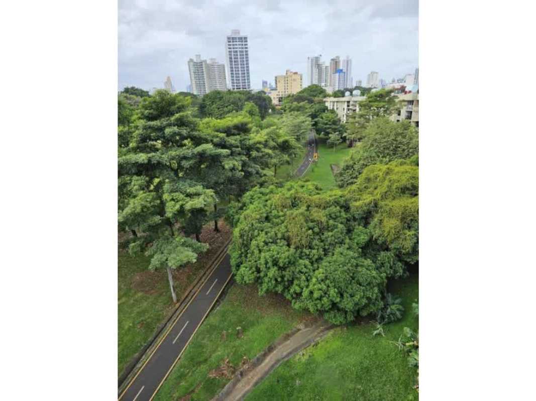 Balcony view overlooking Parque Omar and Panama City skyline at PH Residencias del Sol Carrasquilla