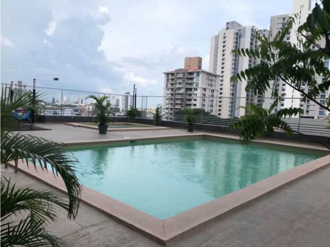 Infinity pool with skyline backdrop at PH Sabana Tower apartment Panama City rental