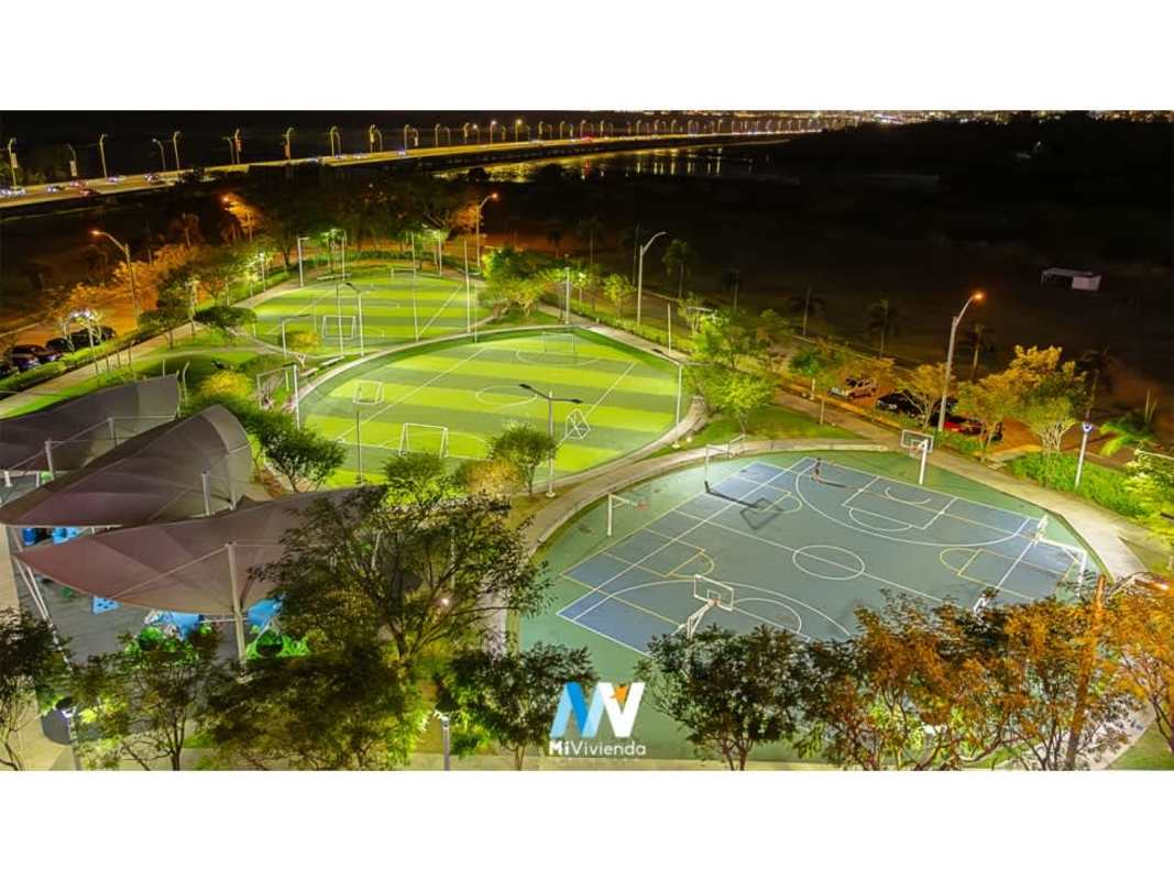 Oceanfront community with bridge, skyline, and waterfront sports courts Costa del Este Panama