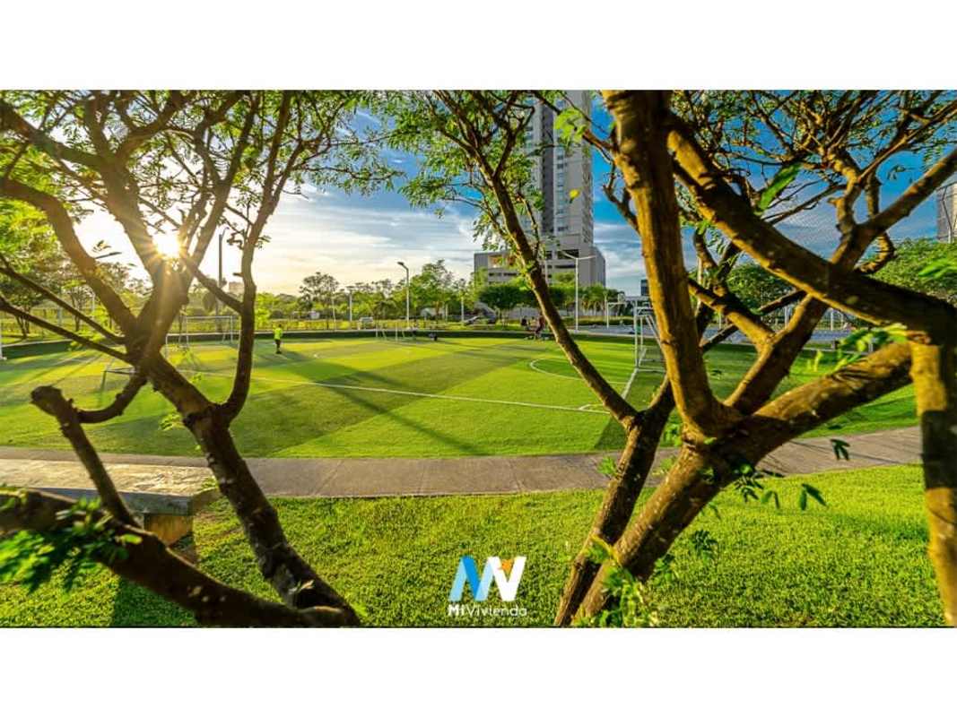 Soccer field, trees, skyline in background, sunny day Costa del Este Panama