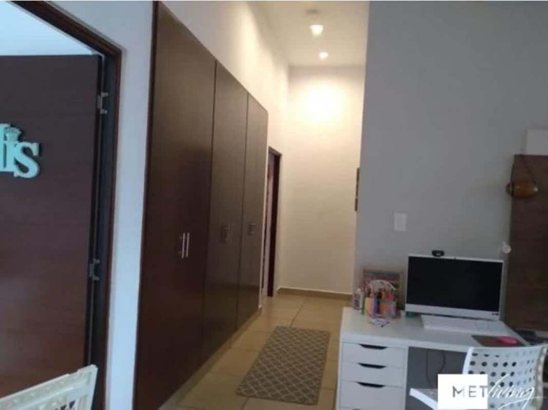 Hallway with workspace nook, built-in wardrobe and bright lighting in PH Olympus house Panama