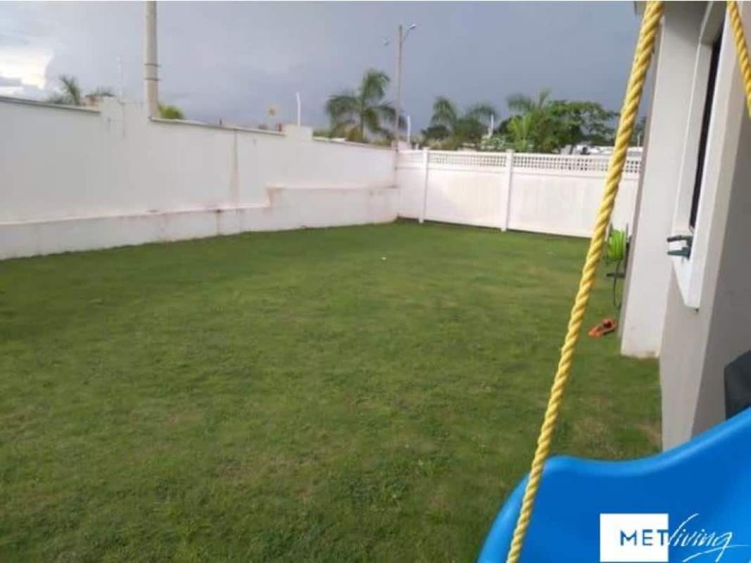 Contemporary kitchen with granite island and window light at PH Olympus Brisas del Golf Panama