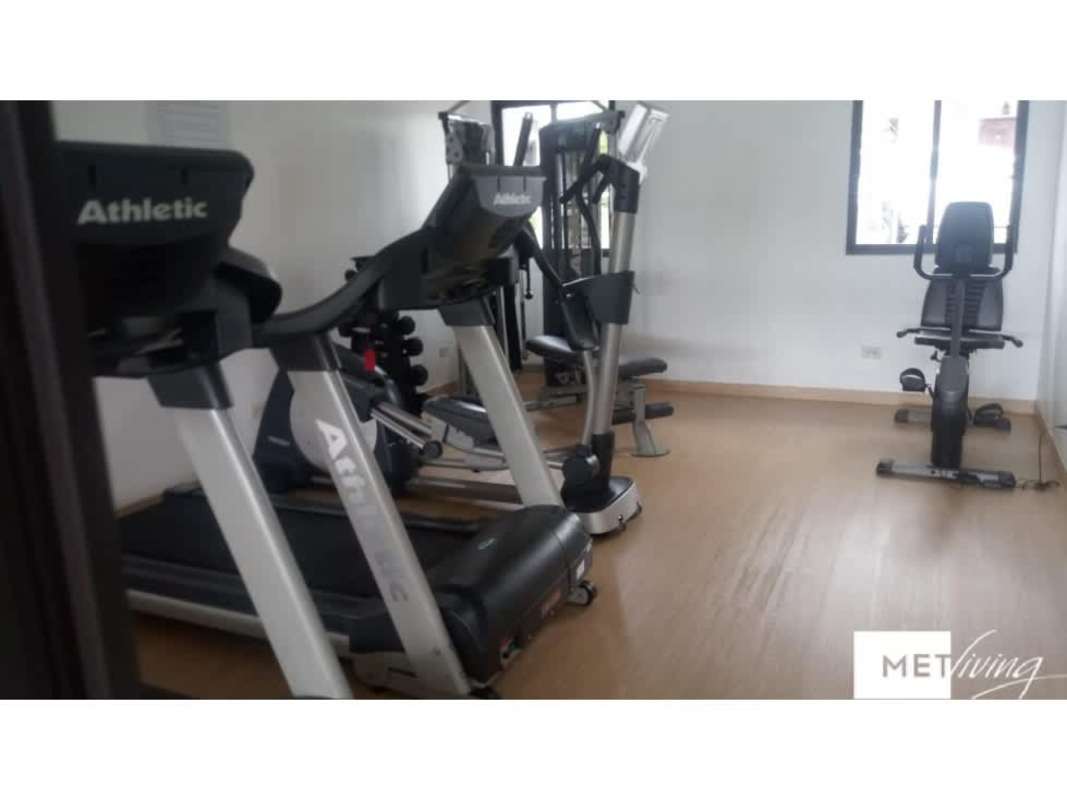 Gym with cardio and weight equipment at PH Olympus Brisas del Golf North Panama