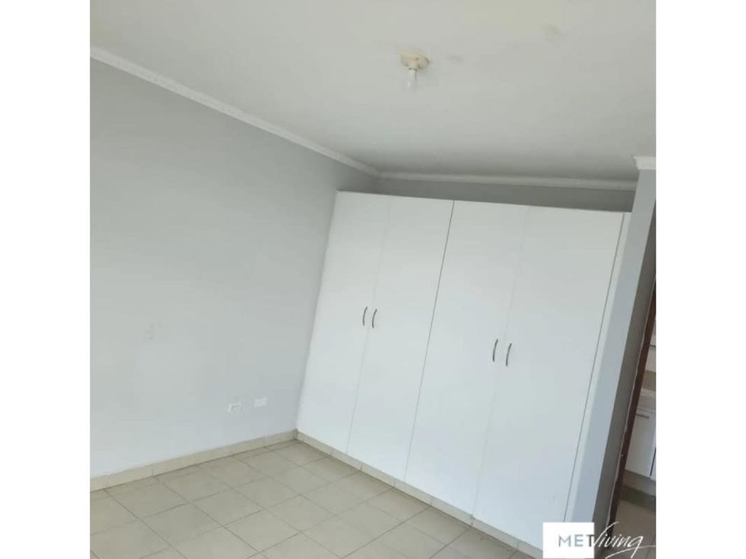 Bedroom featuring built-in wardrobe with neutral wall colors in PH Los Caciques