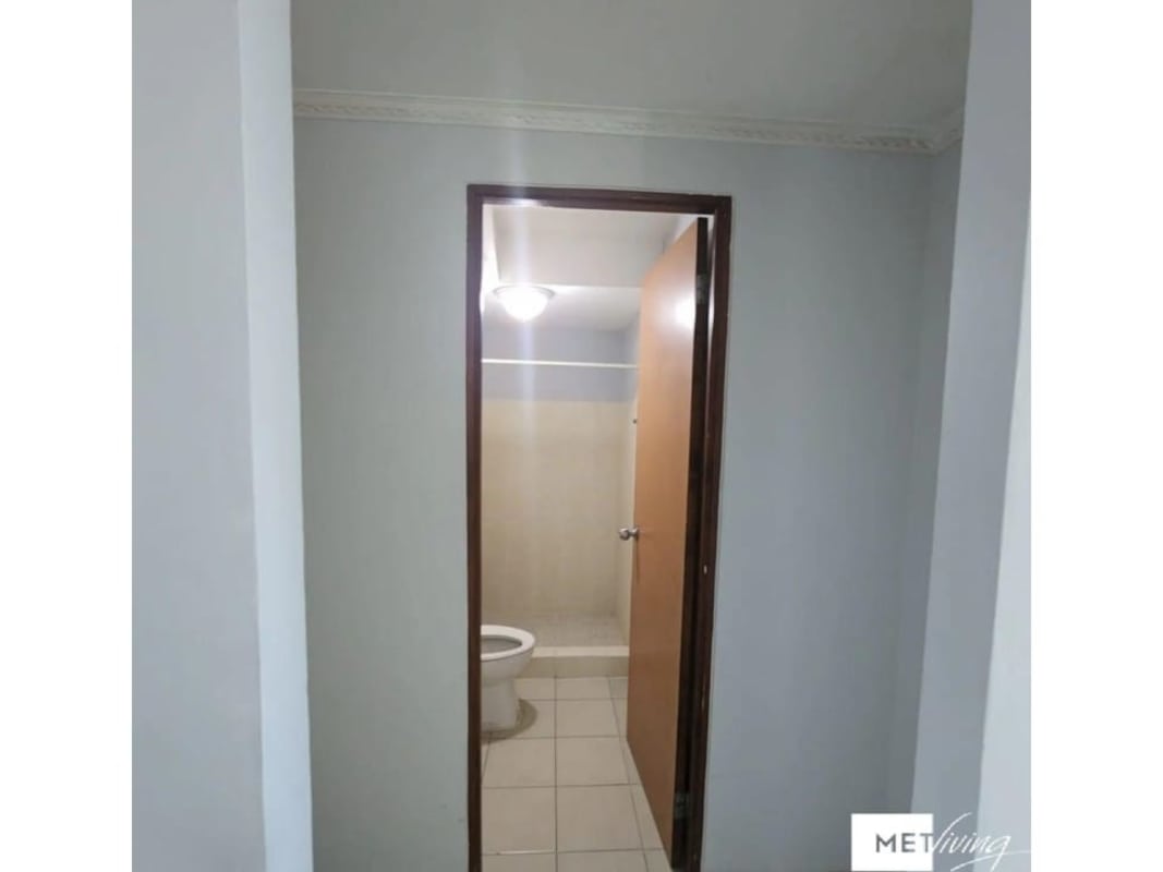 Simple bathroom with toilet, shower, ceramic tile at PH Los Caciques Panama