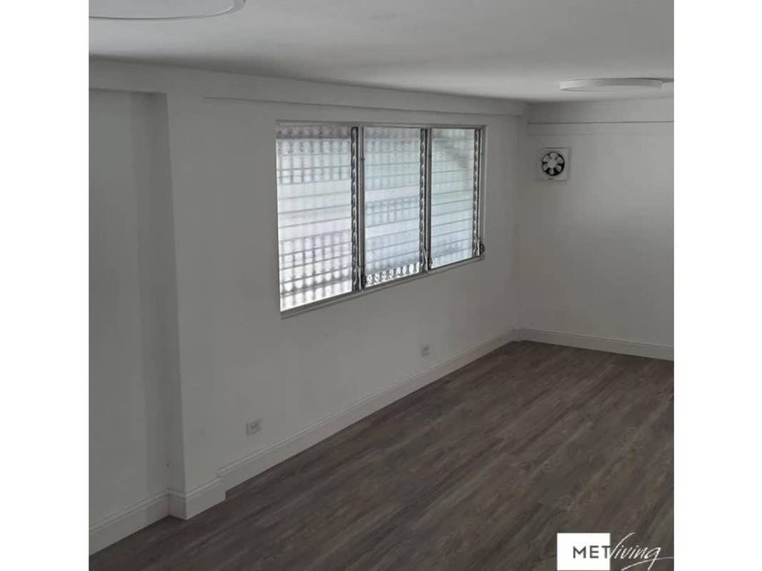 Room with security window bars and wood floor ideal for private office or meeting room rental Panama