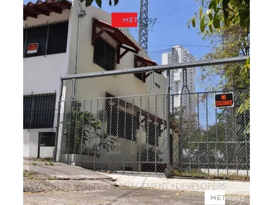 Bright minimalist hallway with white walls leading to office rooms rental in Panama