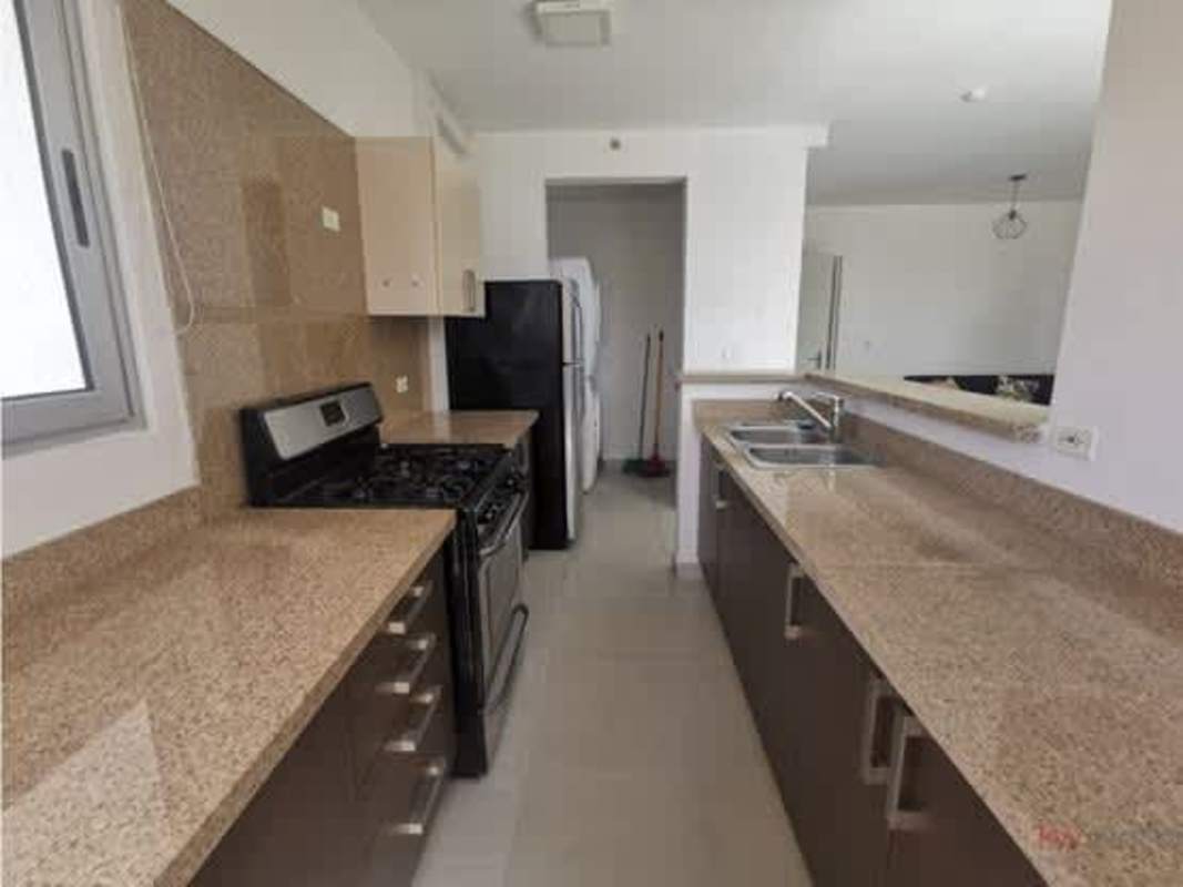 Contemporary kitchen with granite counters appliances and breakfast bar at Ocean Waves Panama
