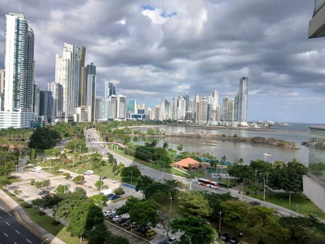 Balcony panoramic view of Pacific Ocean and waterfront skyline from apartment in PH BICSA Panama City