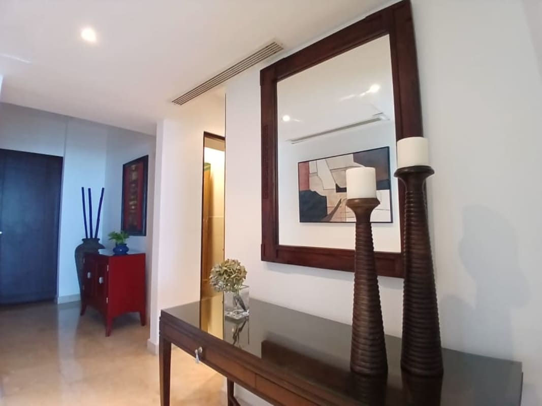 Spacious bedroom with floor-to-ceiling glass door to balcony with oceanview in PH BICSA Panama
