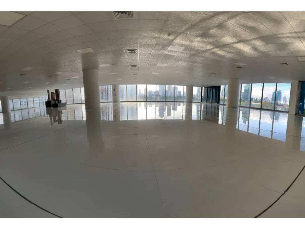 Large open office space with tiled flooring and large windows with city views in Punta Paitilla