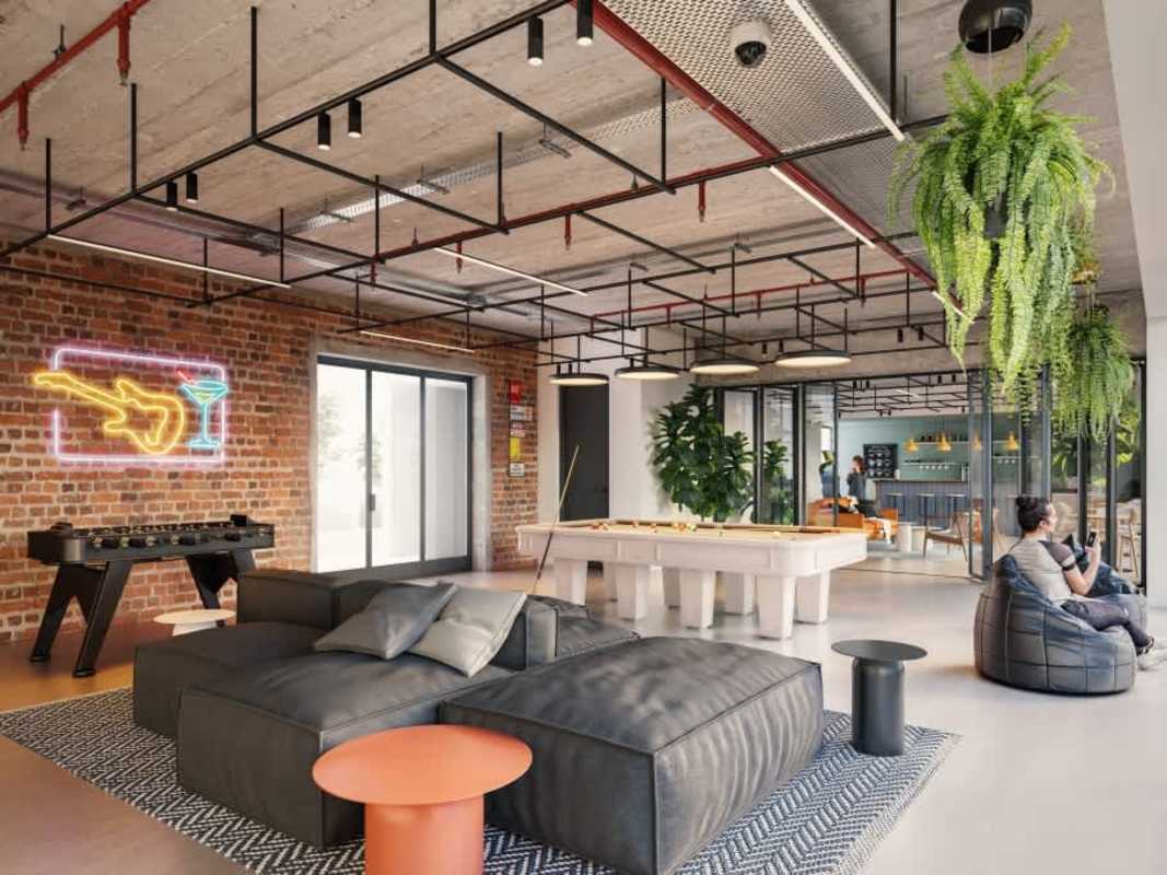 Resident lounge and game room with pool table at Costana Balboa District