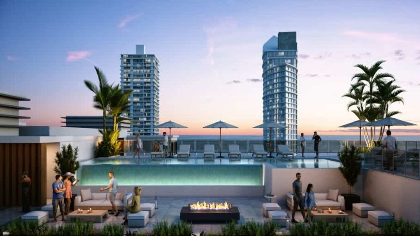 Infinity pool with firepit lounge and panoramic city view at Costana Bella Vista