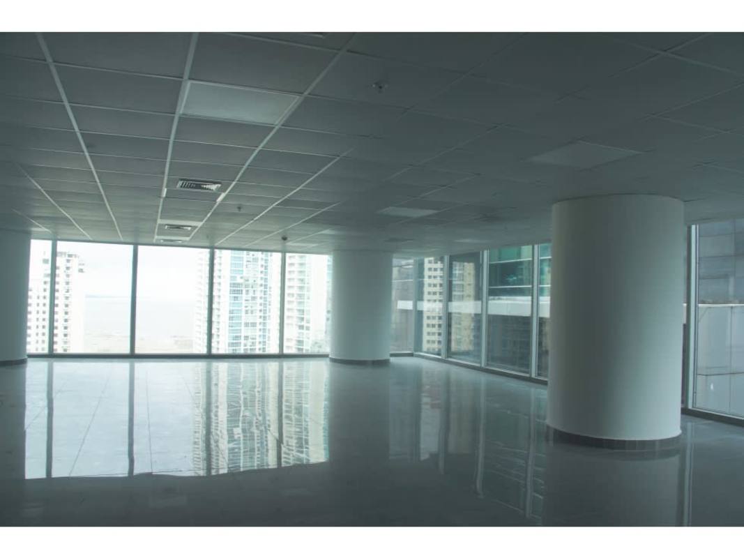 Bright office interior in Oceania Business Plaza with city view windows and tile floors in Punta Paitilla Panama