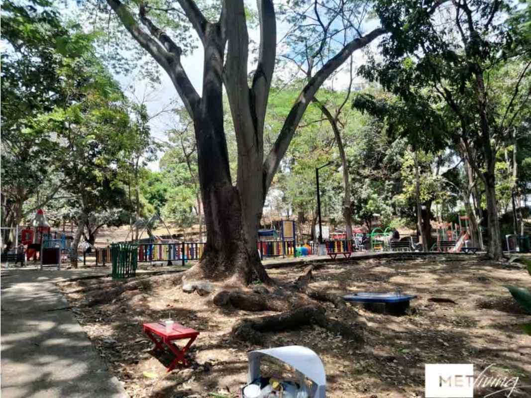 Foresta Tower outdoor children's playground with green area and park view in Panama City