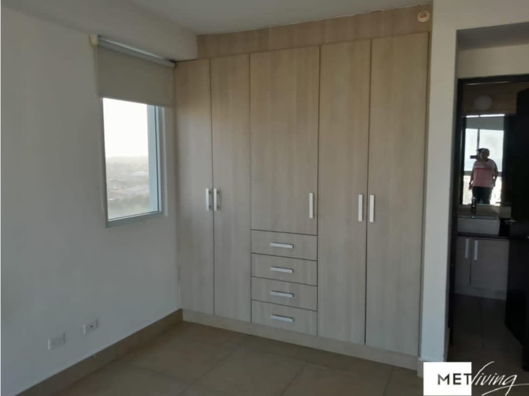 Bedroom with large built-in wardrobe tiled floor window Foresta Tower Panama City