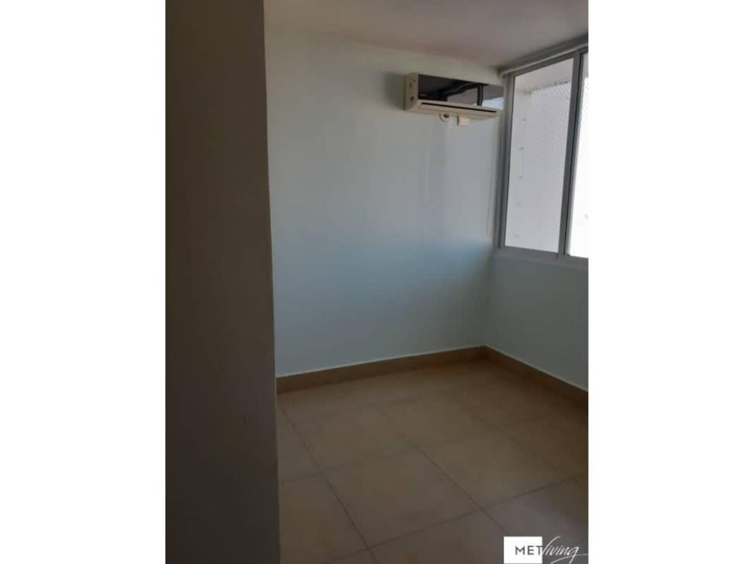 Bright bedroom in Foresta Tower Panama with large window city views air conditioning ready