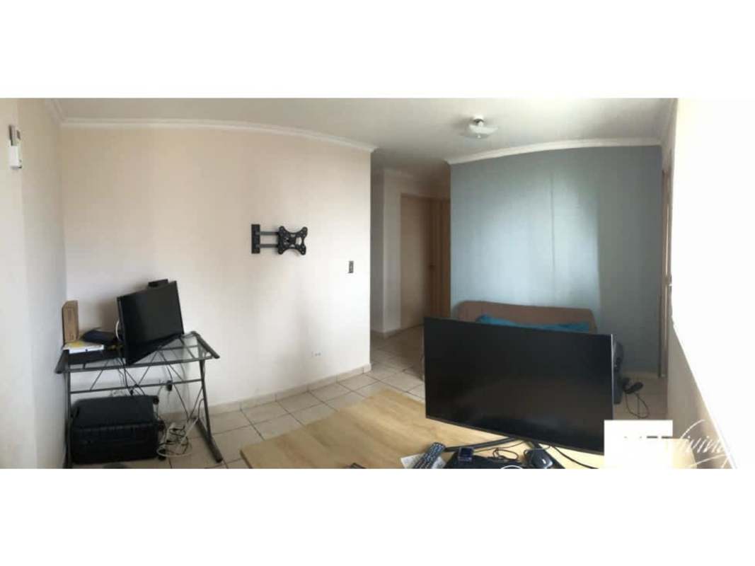 Living area with tile floors and balcony access PH Altos de la Colina Pueblo Nuevo Panama