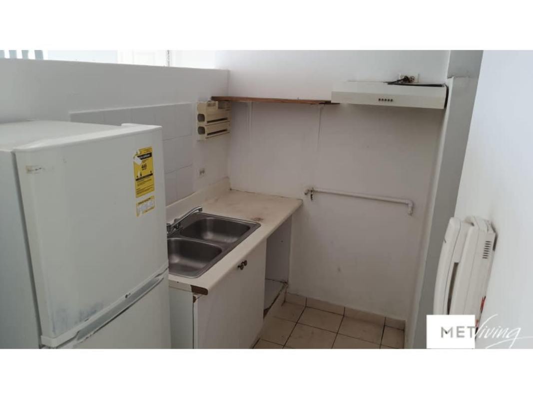 Minimalist kitchen with granite countertop, sink and tile in PH Hato Pintado Panama