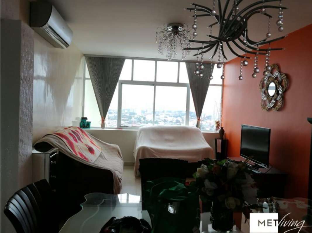 Contemporary living room with city view, accent wall Edison Park Panama