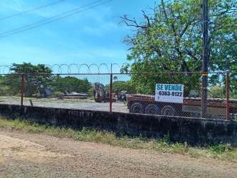 Warehouse interior with concrete floors, steel beams, unfinished walls, Las Lomas David Panama