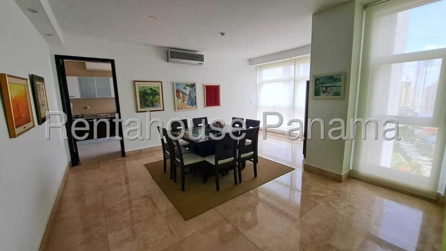 Spacious balcony with glass railings and panoramic ocean and skyline views at PH Q Tower Punta Pacifica Panama