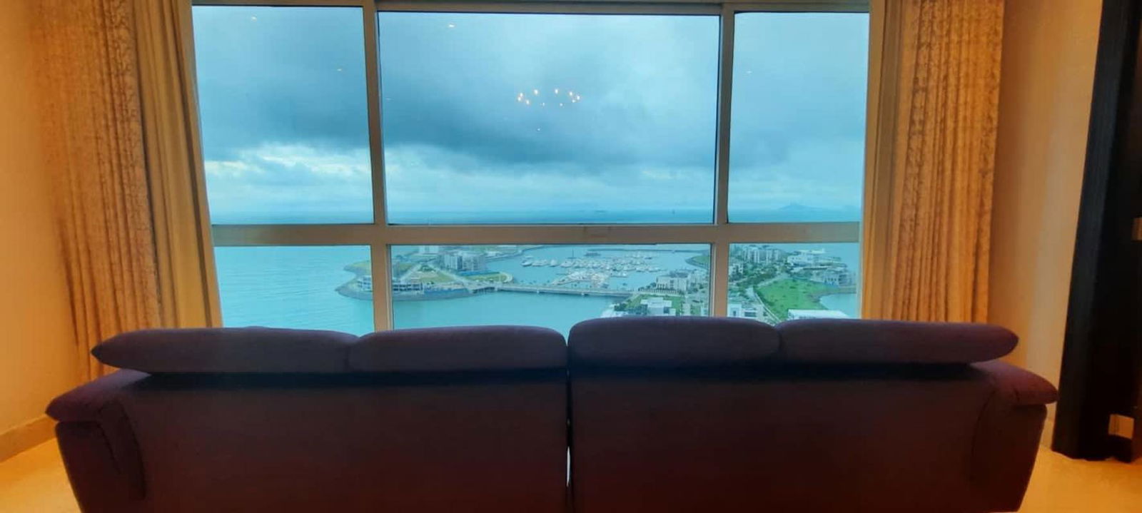 Spacious kitchen with granite island, stainless appliances and city/ocean views in PH Venetian Tower Punta Pacífica