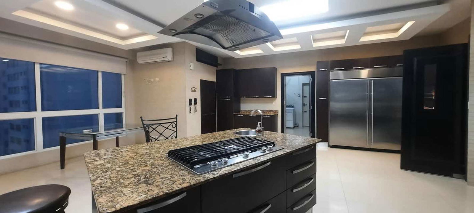 Elegant neoclassical ballroom with chandeliers and columns at PH Venetian Tower Punta Pacífica Panama