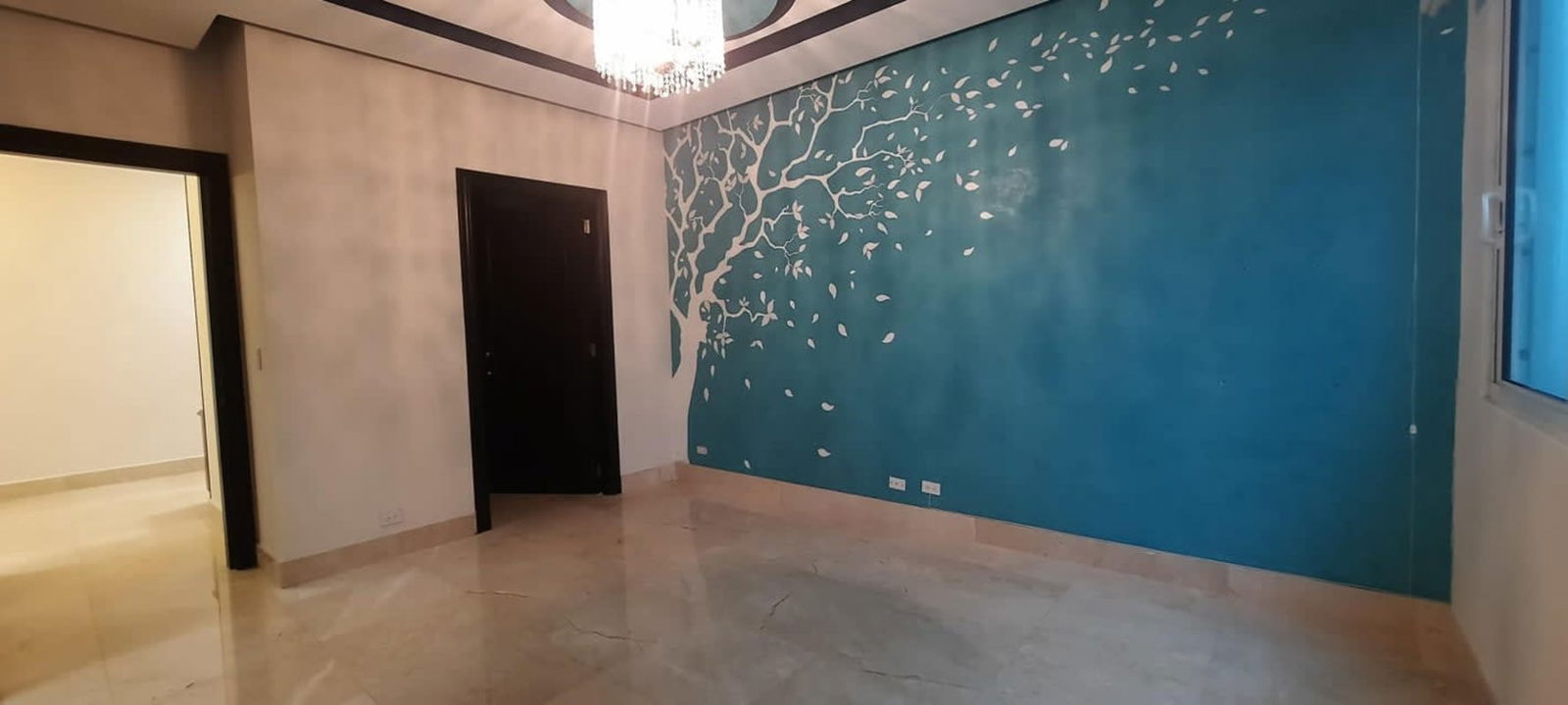 Living room with panoramic ocean and marina views, marble flooring in PH Venetian Tower Panama City