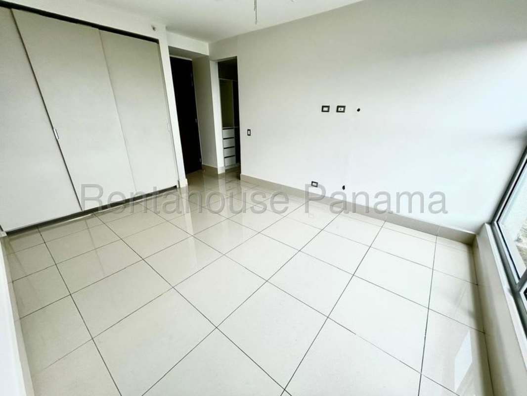 Bedroom with large windows panoramic view ocean skyline Costa del Este Panama