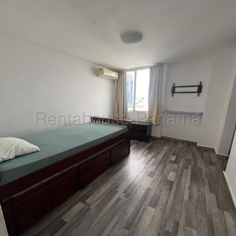 Bright bedroom with built-in closet and air conditioning unit Carrasquilla Tower Panama City