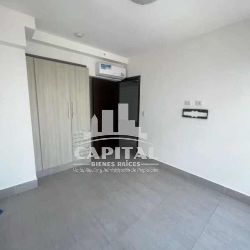 Modern bathroom with glass enclosed shower in PH Titanium Tower Panama City