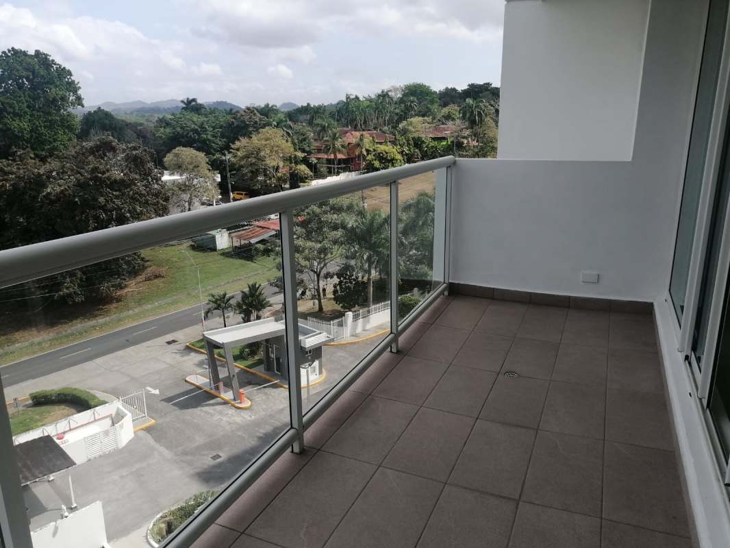 Covered balcony with garden views and tiled flooring PH Clayton Park Panama