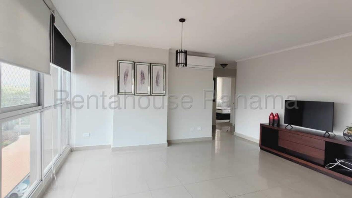 Modern bathroom with granite countertop, glass shower enclosure and tile walls in PH Creta Chanis