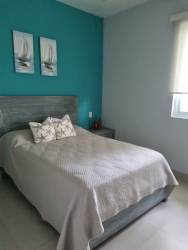 Furnished bedroom with air conditioning Casamar beach apartment Panama