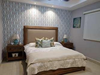 Terrace with garden view in Casamar Villamar beach apartment Panama