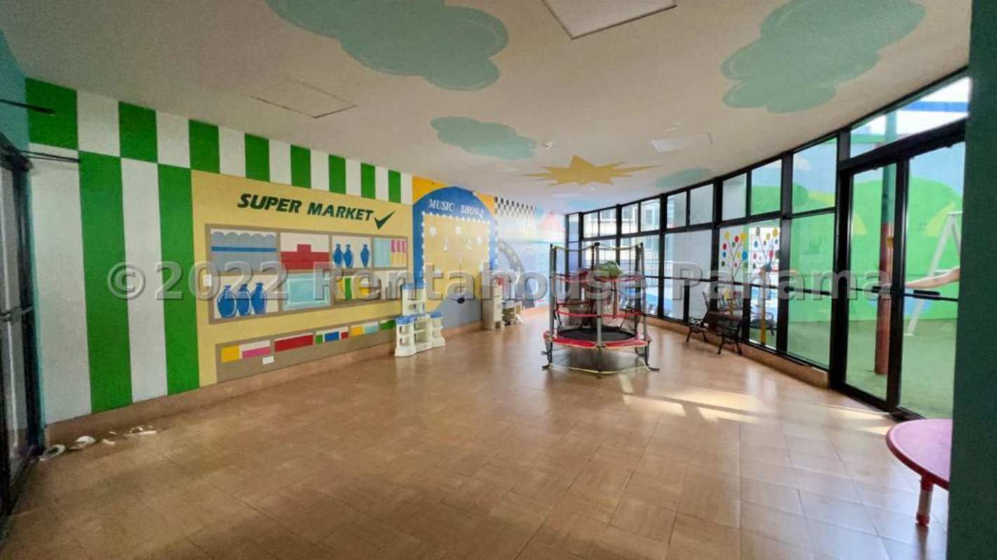 Game room with pool table large windows city view PH Los Delfines Avenida Balboa Panama