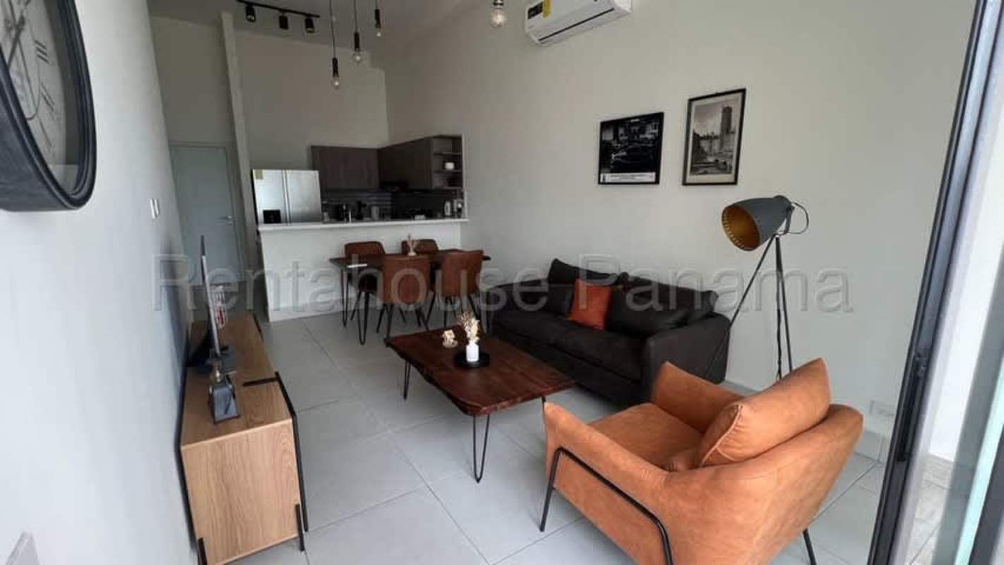 Private balcony with glass railing overlooking Panama City from PH Coco Place Coco del Mar