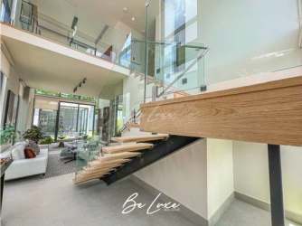 Spacious open plan living and dining with large windows PH Explora Panama Pacifico