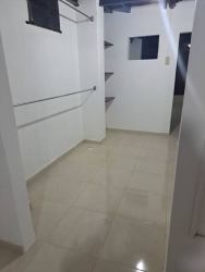 Bedroom with tiled flooring window natural light affordable apartment rent Chitré