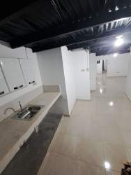 Kitchenette with sink cabinets ceramic floor affordable apartment rental Chitré